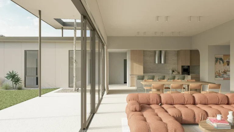 Living and dining area of Project Harwood with floor-to-ceiling glazing overlooking a private courtyard, terracotta modular sofa, and open-plan kitchen beyond
