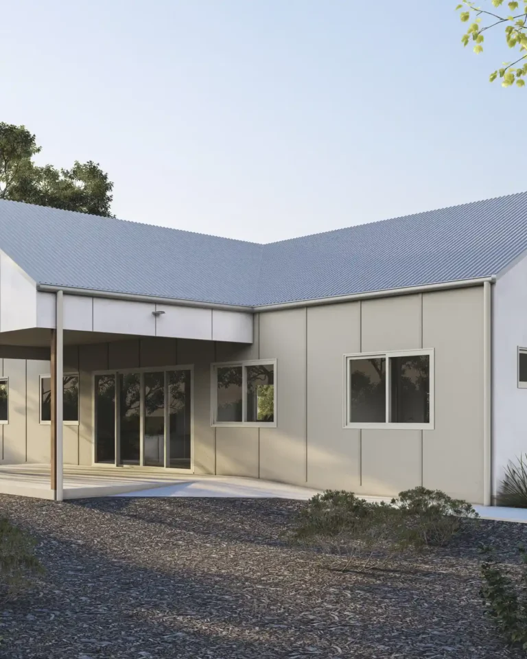 Kyle Andrews Foundation holiday cabin exterior, Siesta Park, Caves Road — barn-style build with covered alfresco and native gardens