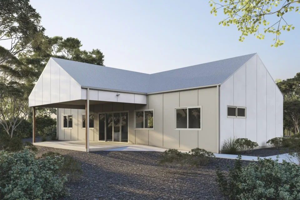 Kyle Andrews Foundation holiday cabin exterior, Siesta Park, Caves Road — barn-style build with covered alfresco and native gardens