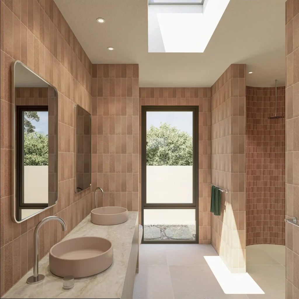 Ensuite bathroom in Project Harwood featuring terracotta subway tiles, dual round vessel basins on a marble benchtop, freestanding bath, and floor-to-ceiling window overlooking lush garden in Dunsborough WA