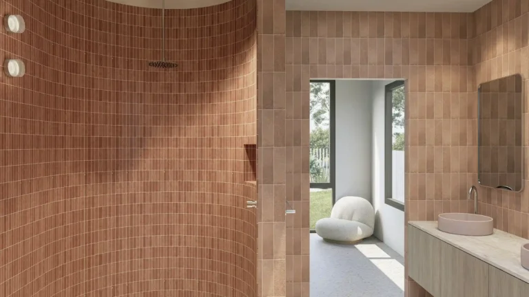 Master ensuite in Project Harwood with curved terracotta-tiled shower wall, skylight, timber floating vanity with vessel basin, and open walkthrough to adjoining room in Cape Rise, Dunsborough WA